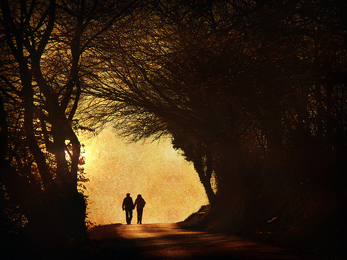 couple walking in the light